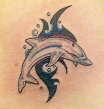 Dolphin tattoos hold a lot of importance to any one who holds their freedom 